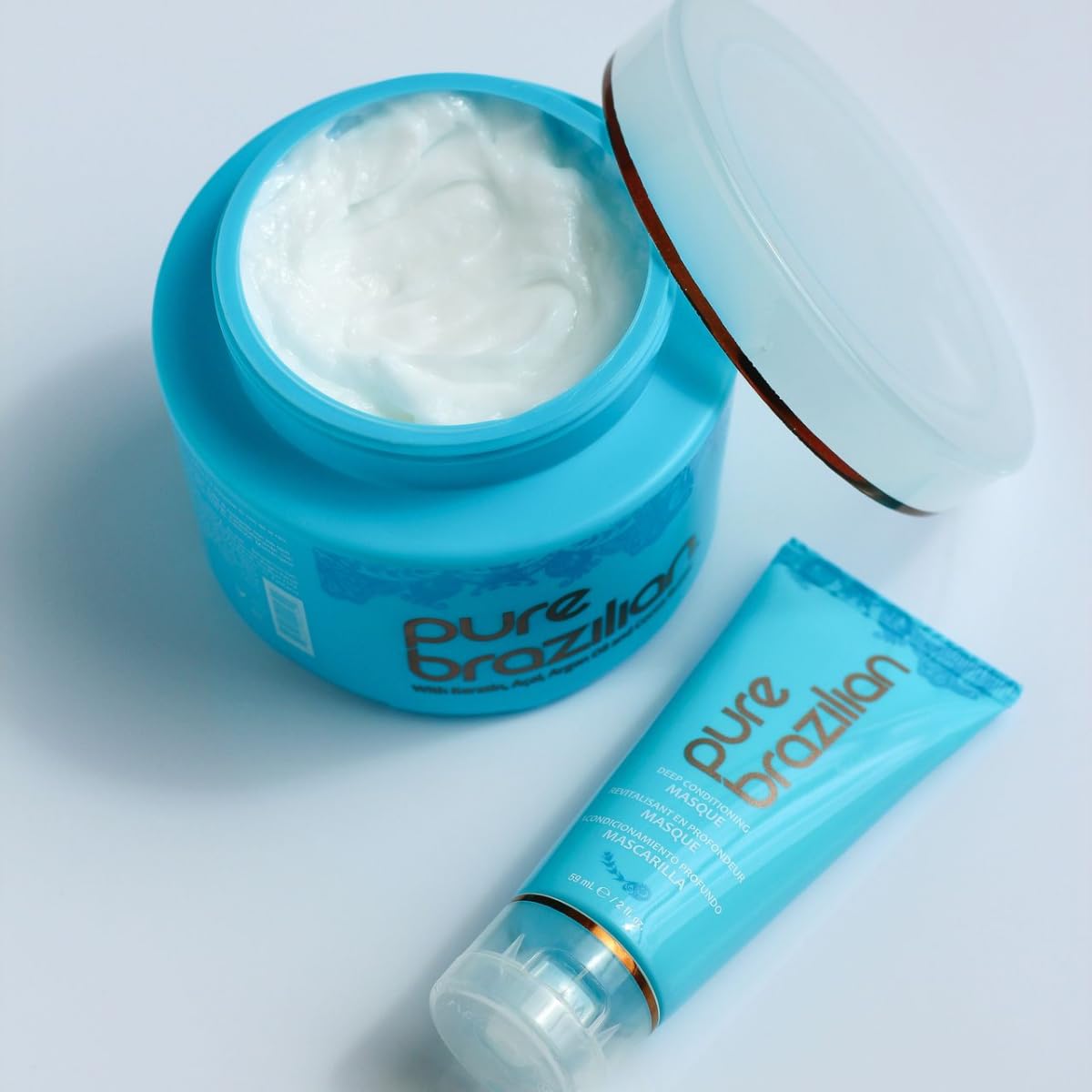 Pure Brazilian Deep Conditioning Masque frizz-free strands shown for smoother styling.