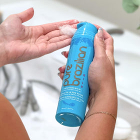 Pure Brazilian Silk Smoothing Balm applied for sleek, straight-looking results