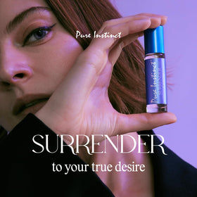 Pure Instinct SURRENDER roll-on application ready for on-the-go scent touchups