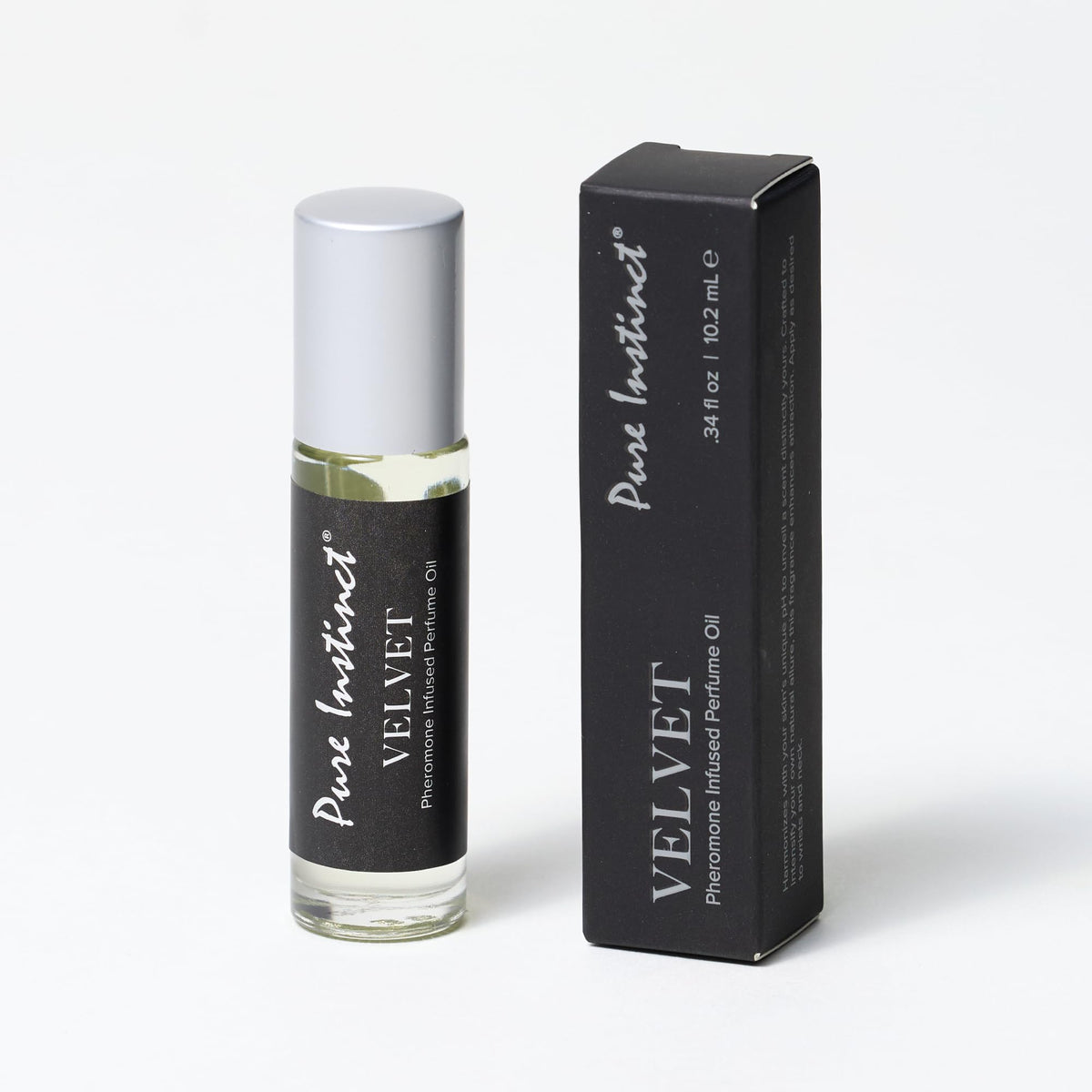 Pure Instinct Velvet rollerball application close-up for precise skin use.