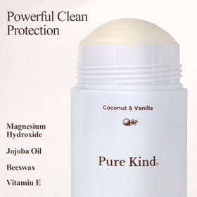 Close-up of Pure Kind ingredients with jojoba oil and beeswax for skin care.