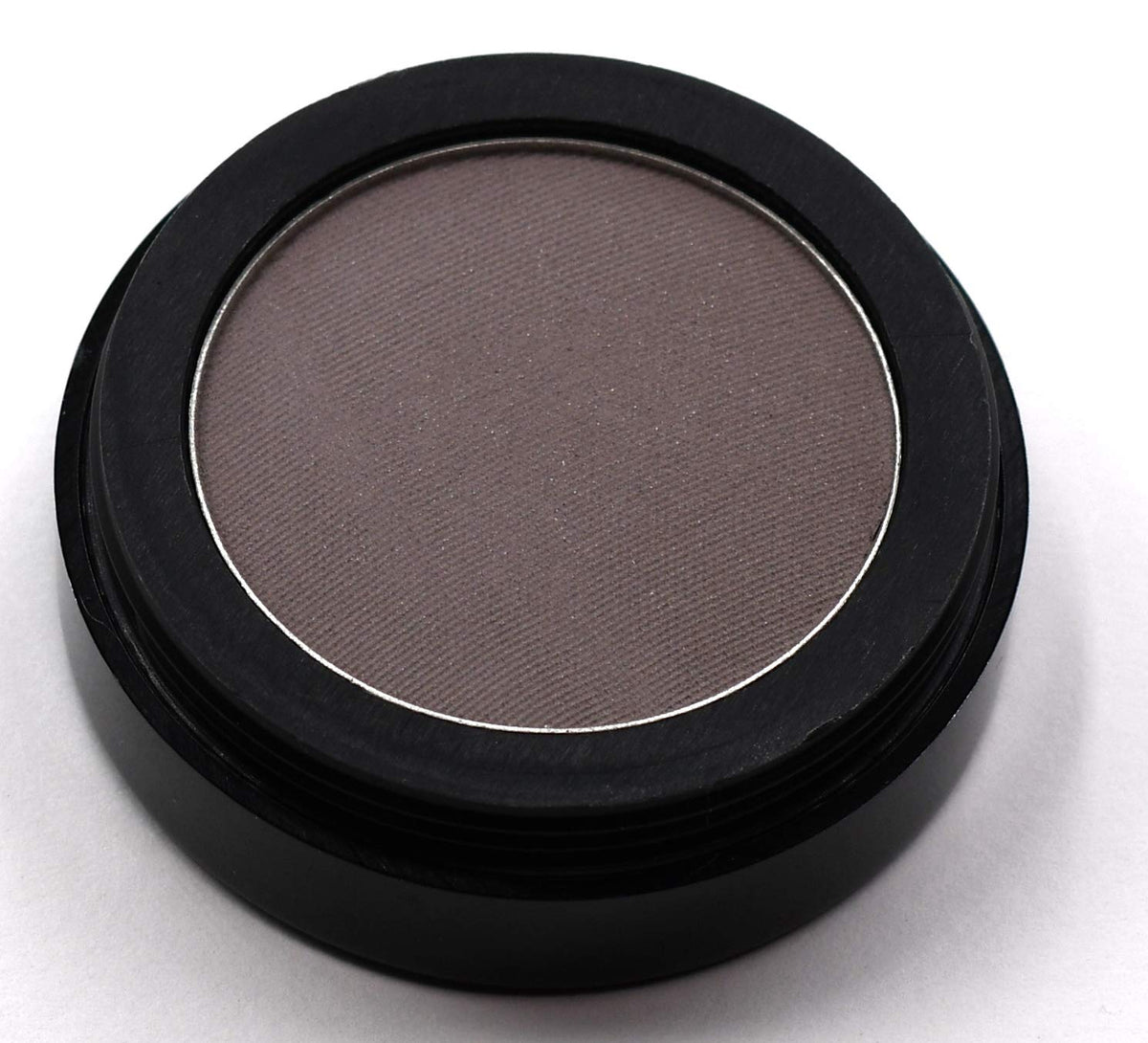 Pure Ziva pressed powder compact closeup highlights portable vegan shade for on-the-go color.