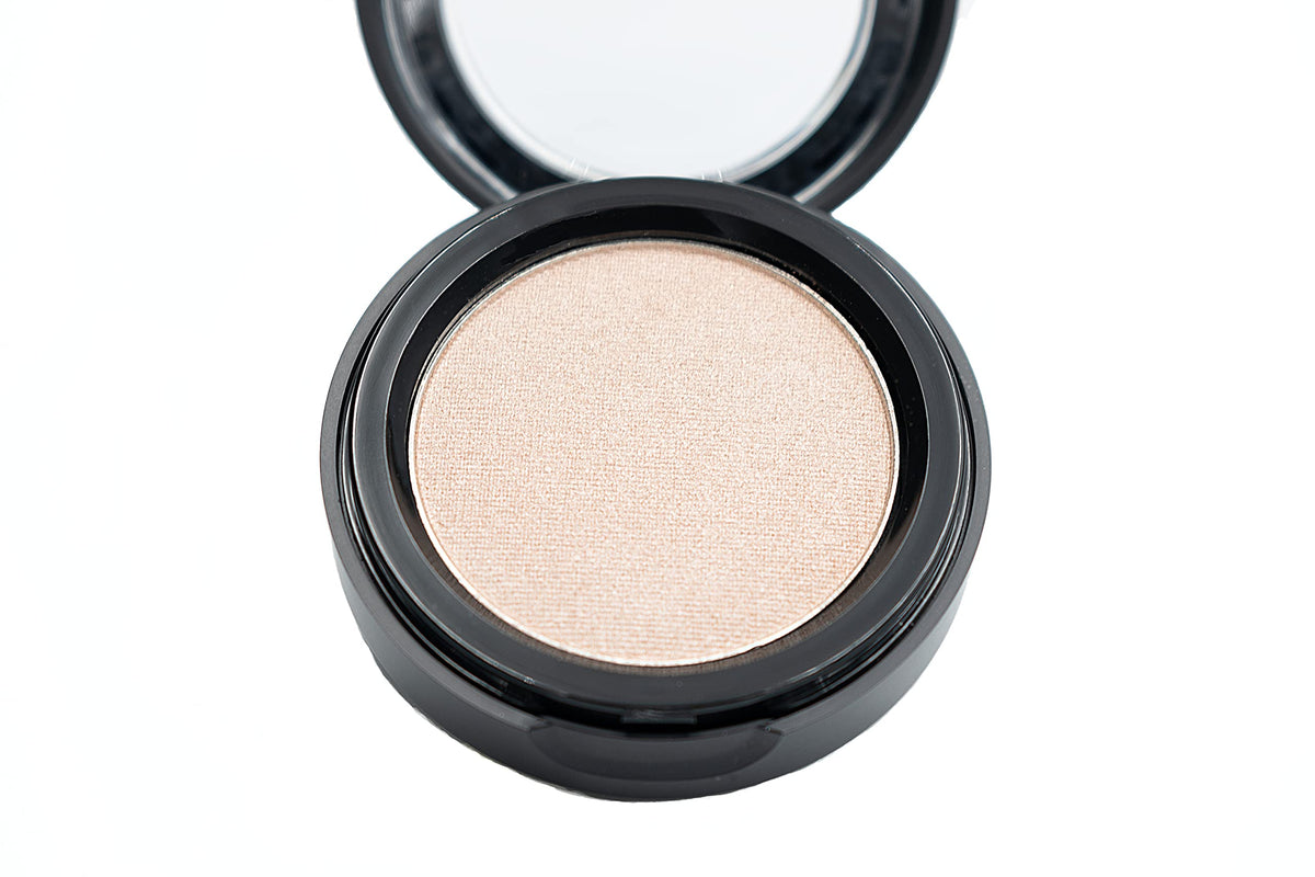 Pure Ziva satin finish pressed powder swatch, showing creamy, even color.