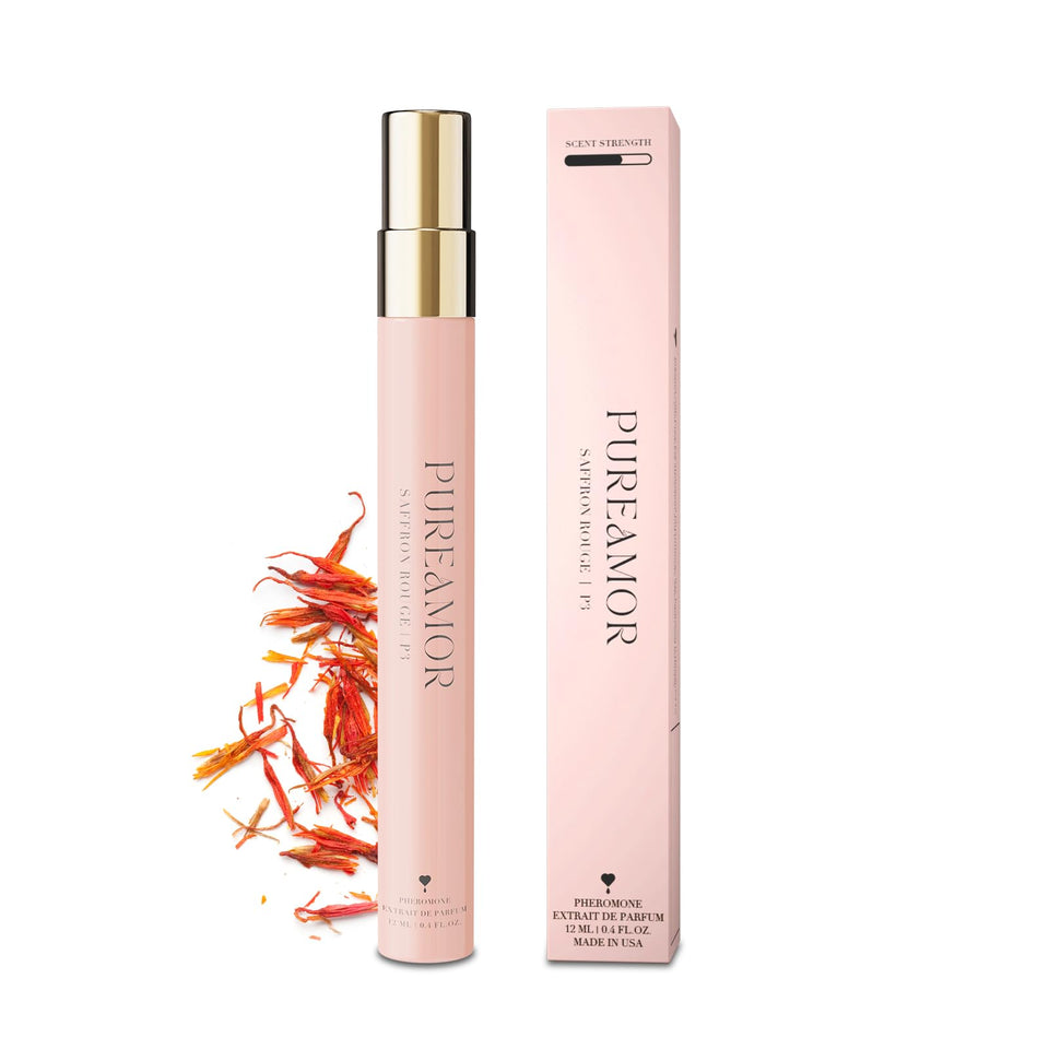 PUREAMOR Saffron Rouge bottle with warm amber and cedarwood notes for evening wear.