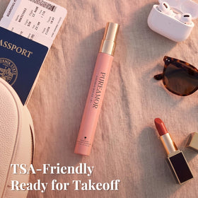 Travel-size PUREAMOR spray for quick on-the-go fragrance refresh.