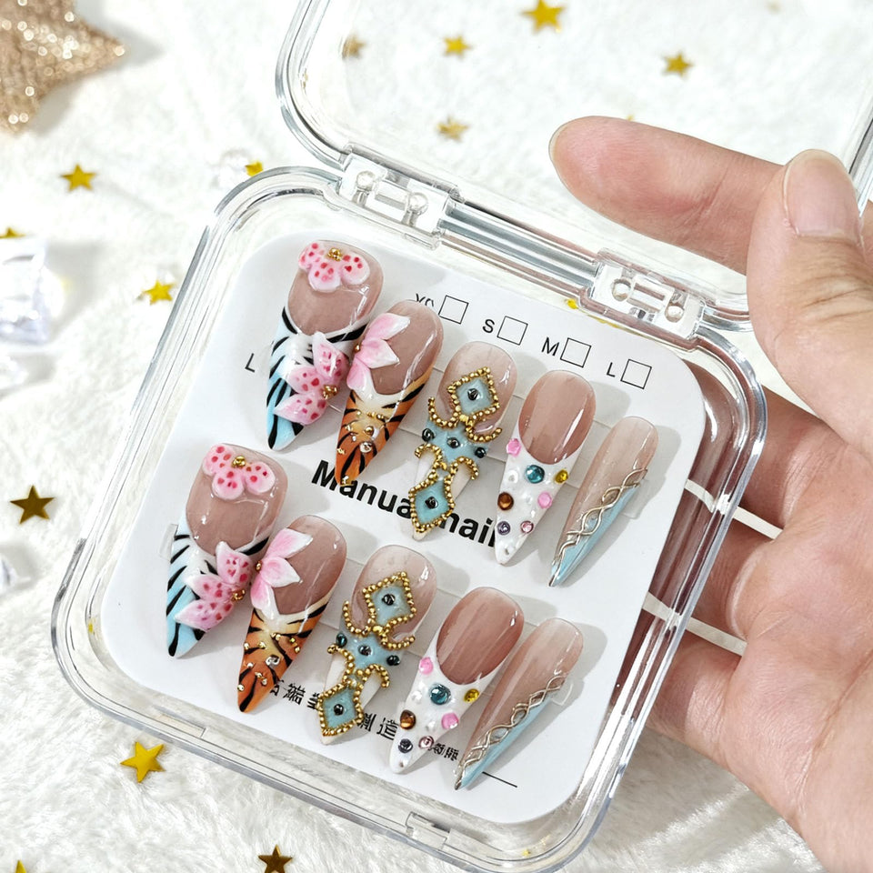 PureGlow Co 3D flower leopard nails on long stilettos for a bold manicure
