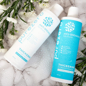 Purezero shampoo foam closeup illustrates rich lather for gentle cleansing.