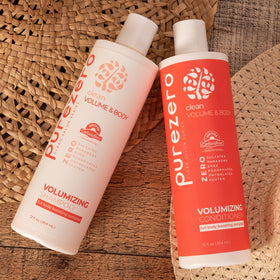 Close-up of PureZero Volumizing Shampoo lather showing gentle cleansing