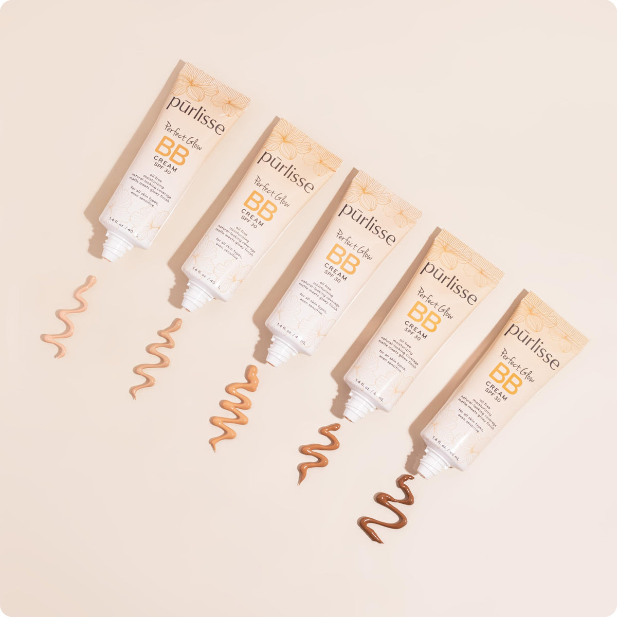 Purlisse BB Cream being applied with fingers for easy blending.