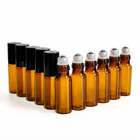 PYAWI amber roller bottle with black cap close-up to prevent leaks.