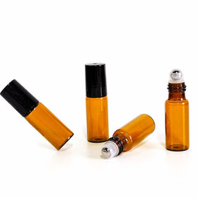 PYAWI amber roller bottle with two funnels for easy refilling.