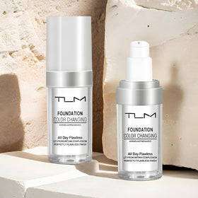 Makeup base application on the face using QINGFANGLI TLM for even coverage.