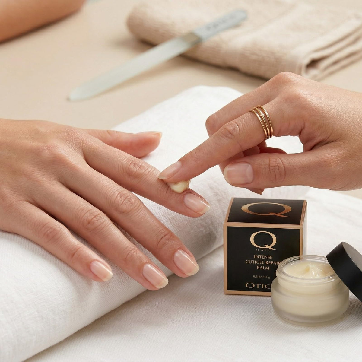 Travel-size QTICA balm jar for on-the-go touch-ups.