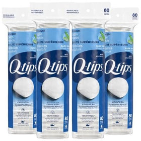 Q-tips Beauty Premium Cotton Rounds pack closeup showing soft, lint-free texture.