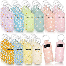 Quelay daisy lipstick holder keychain in pink keeps lip products organized and within reach.