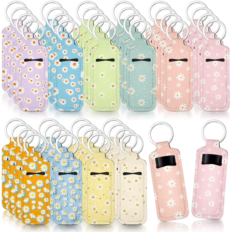 Quelay daisy lipstick holder keychain in pink keeps lip products organized and within reach.