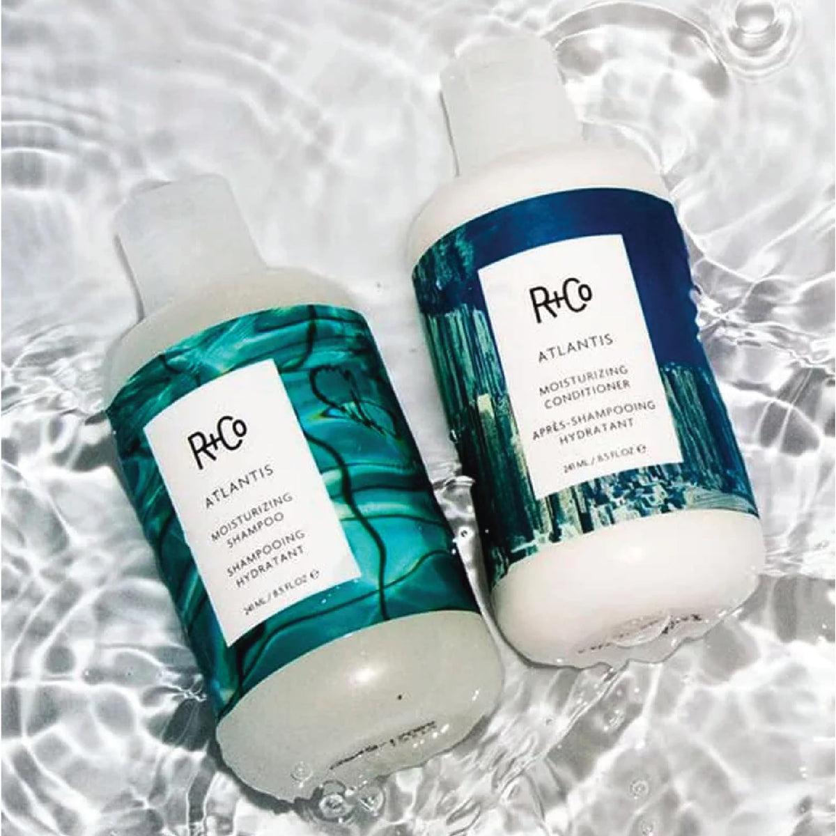R+Co Atlantis B5 travel bottles tucked in a compact bag
