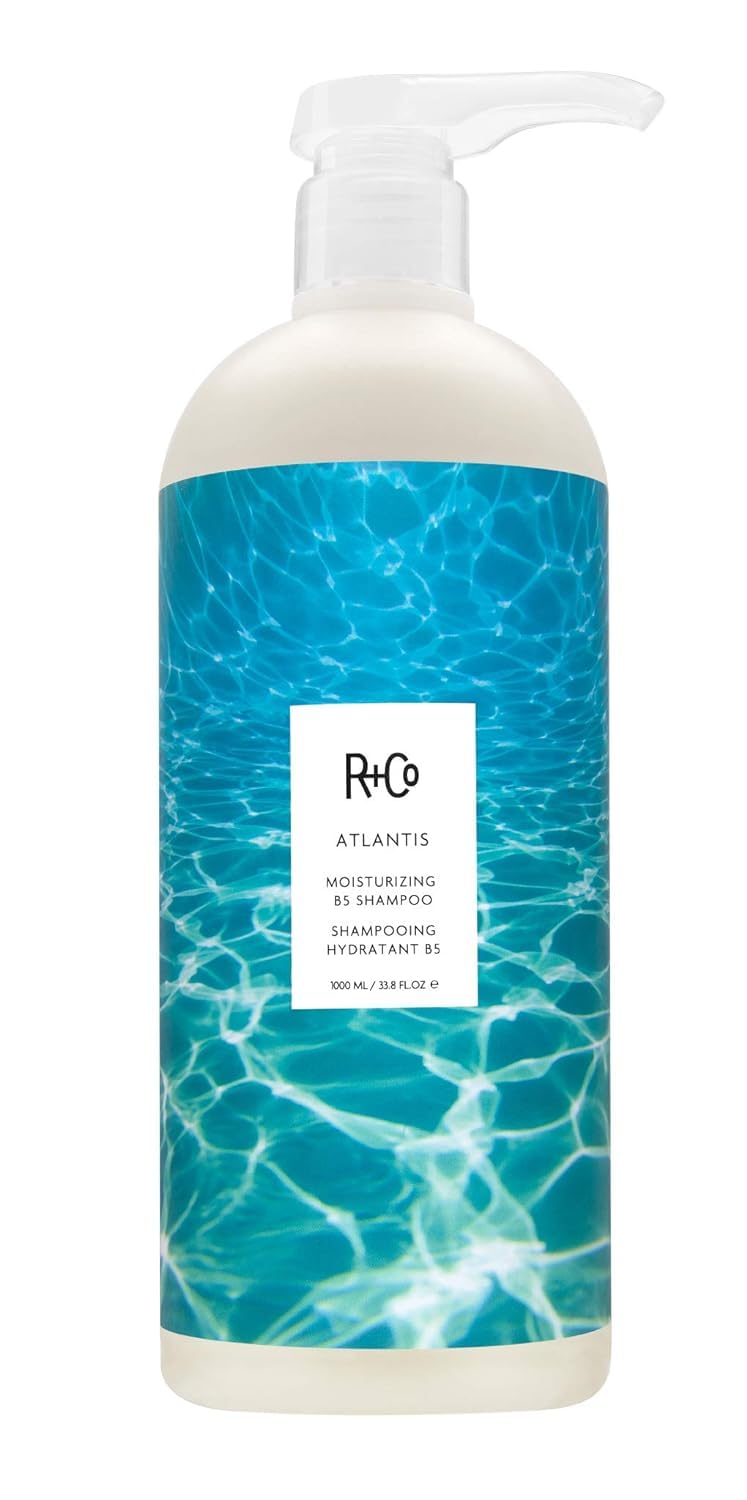 R+Co Atlantis Moisturizing B5 Shampoo bottle highlighting hydration benefits.