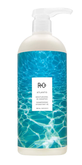 R+Co Atlantis Moisturizing B5 Shampoo bottle highlighting hydration benefits.