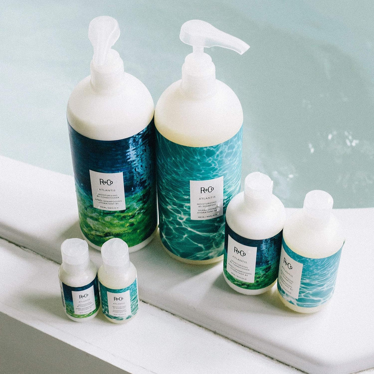 R+Co Atlantis shampoo foam for smooth, manageable hair.