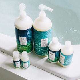 R+Co Atlantis shampoo foam for smooth, manageable hair.
