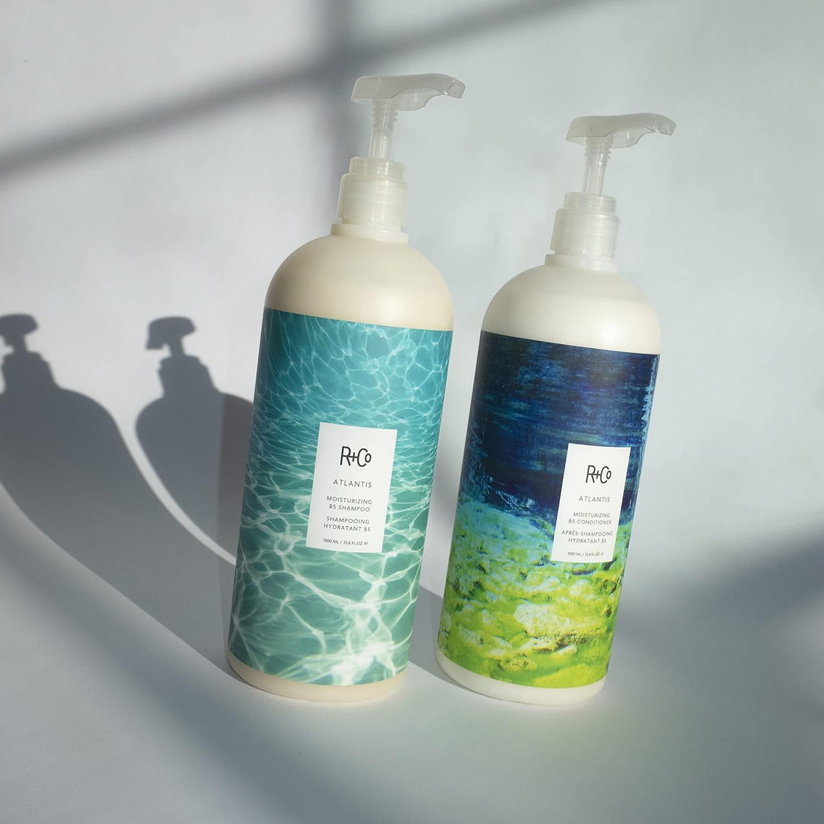 R+Co Atlantis label emphasizes vitamin and mineral infusion for strength.