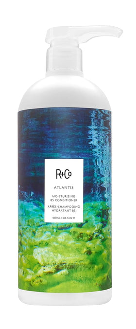 R+Co Atlantis conditioner bottle delivering hydration for dry hair