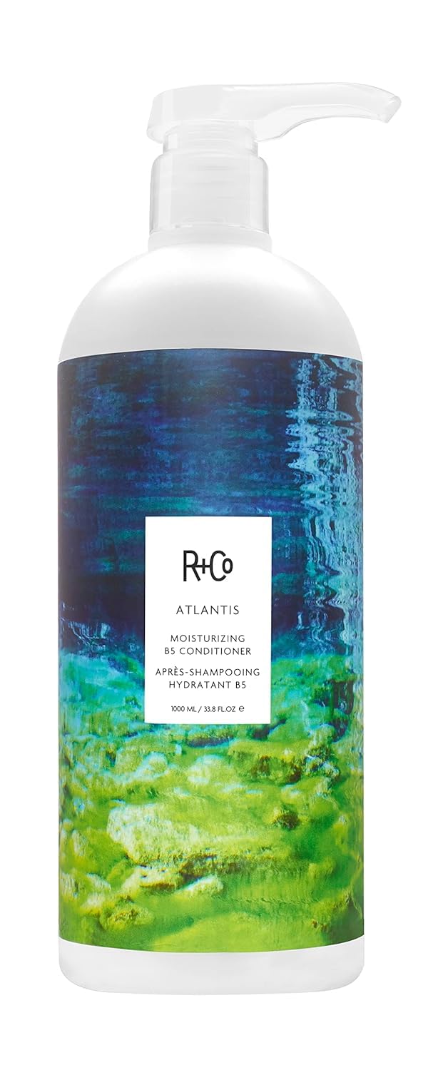 R+Co Atlantis conditioner bottle delivering hydration for dry hair