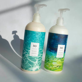 Close-up of R+Co Atlantis shampoo lather showing rich cleansing foam