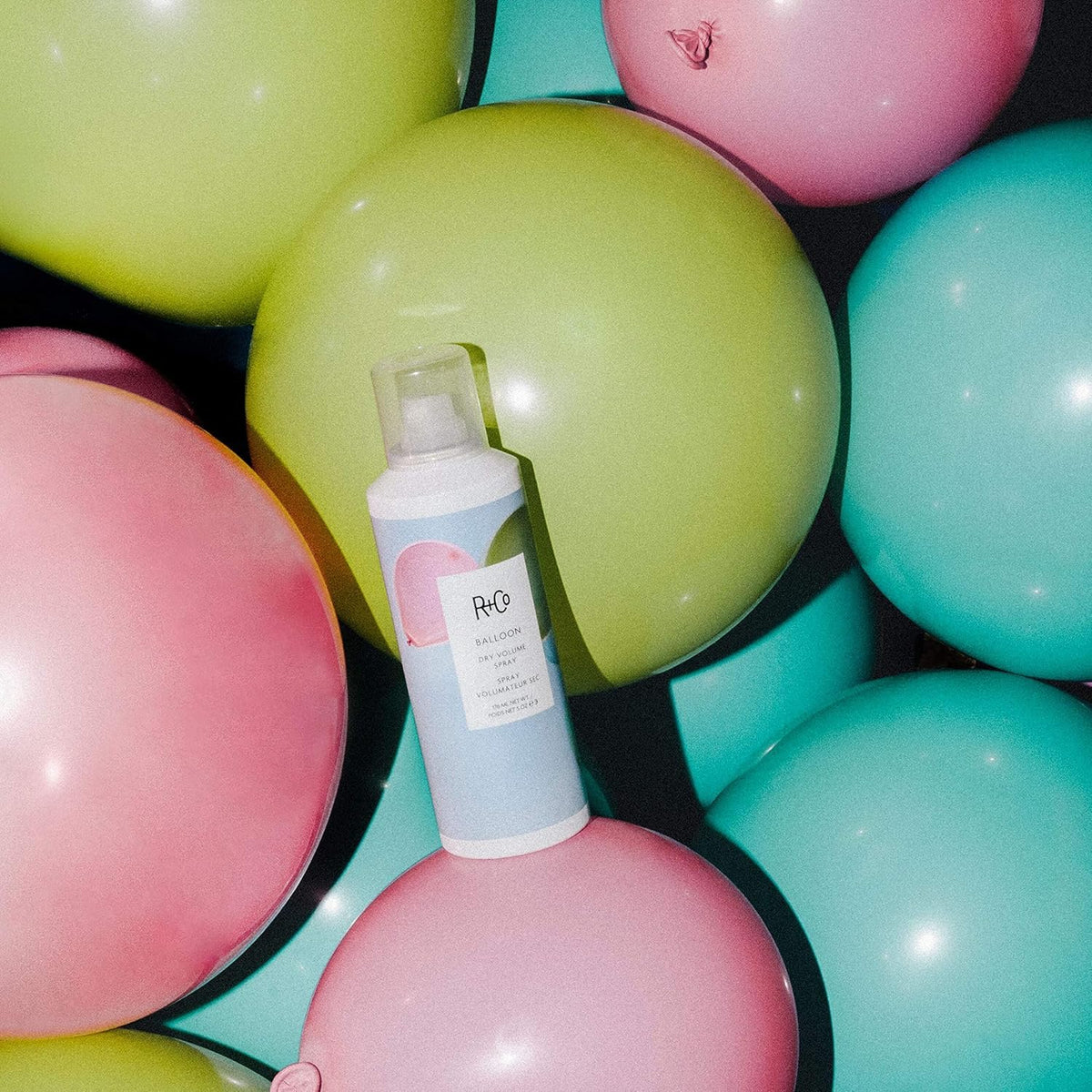 R+Co Balloon Dry Volume Spray finish without weighing hair down.
