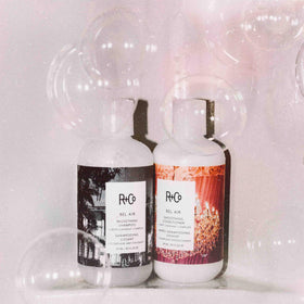 R+Co Bel Air smoothing conditioner applying on hand showing easy use.