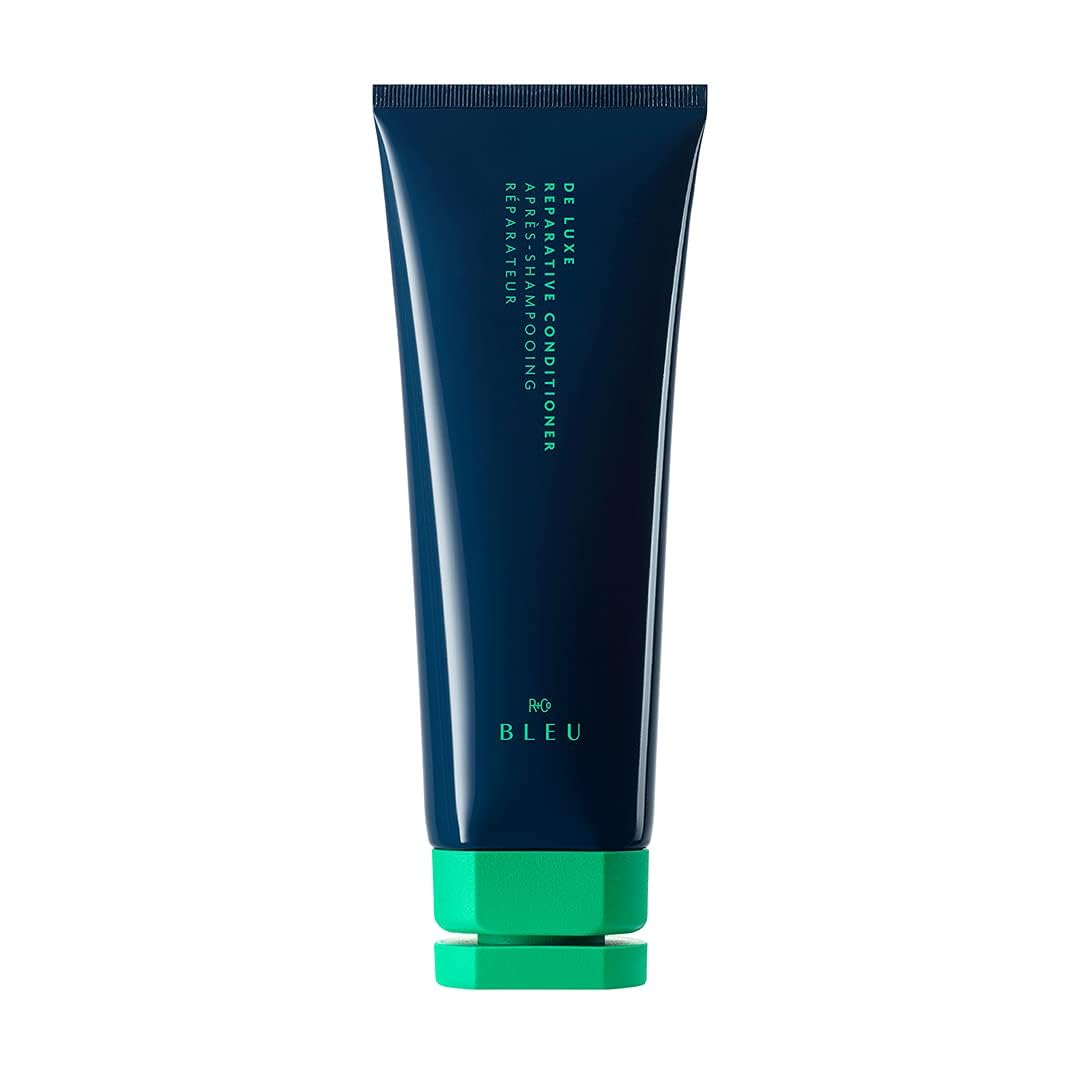 R+Co BLEU De Luxe bottle front shows rich hydration for damaged hair.