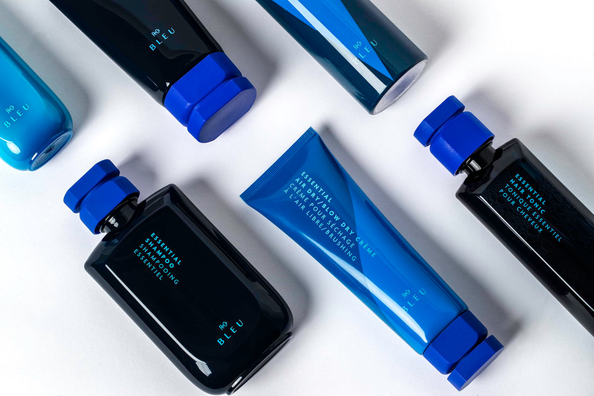 R+Co BLEU frizz control close-up on sleek strands.
