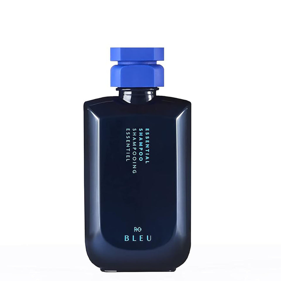 R+Co BLEU Essential Shampoo bottle close-up highlighting hydration.
