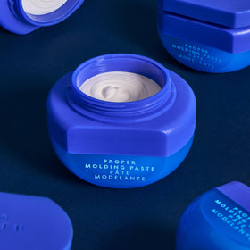 Close-up of BLEU Proper Molding Paste texture demonstrating defined styling potential