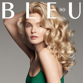 R+Co BLEU bottle with a glossy finish showcasing shine and vibrancy.