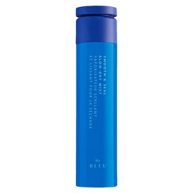 R+Co BLEU bottle close-up showing sealing action for frizz control