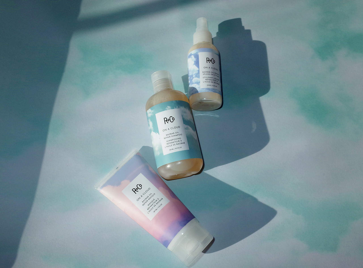 R+Co On A Cloud Baobab Repair Shampoo featuring essential oils for healthy-looking hair.