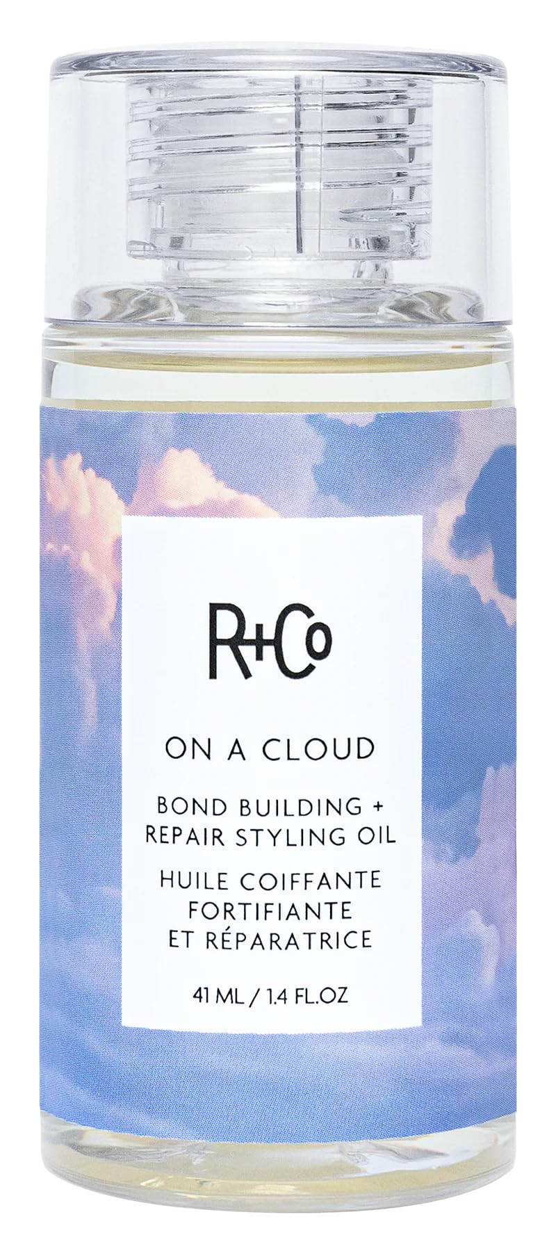 R+Co On a Cloud Bond bottle used for frizz control and shine.
