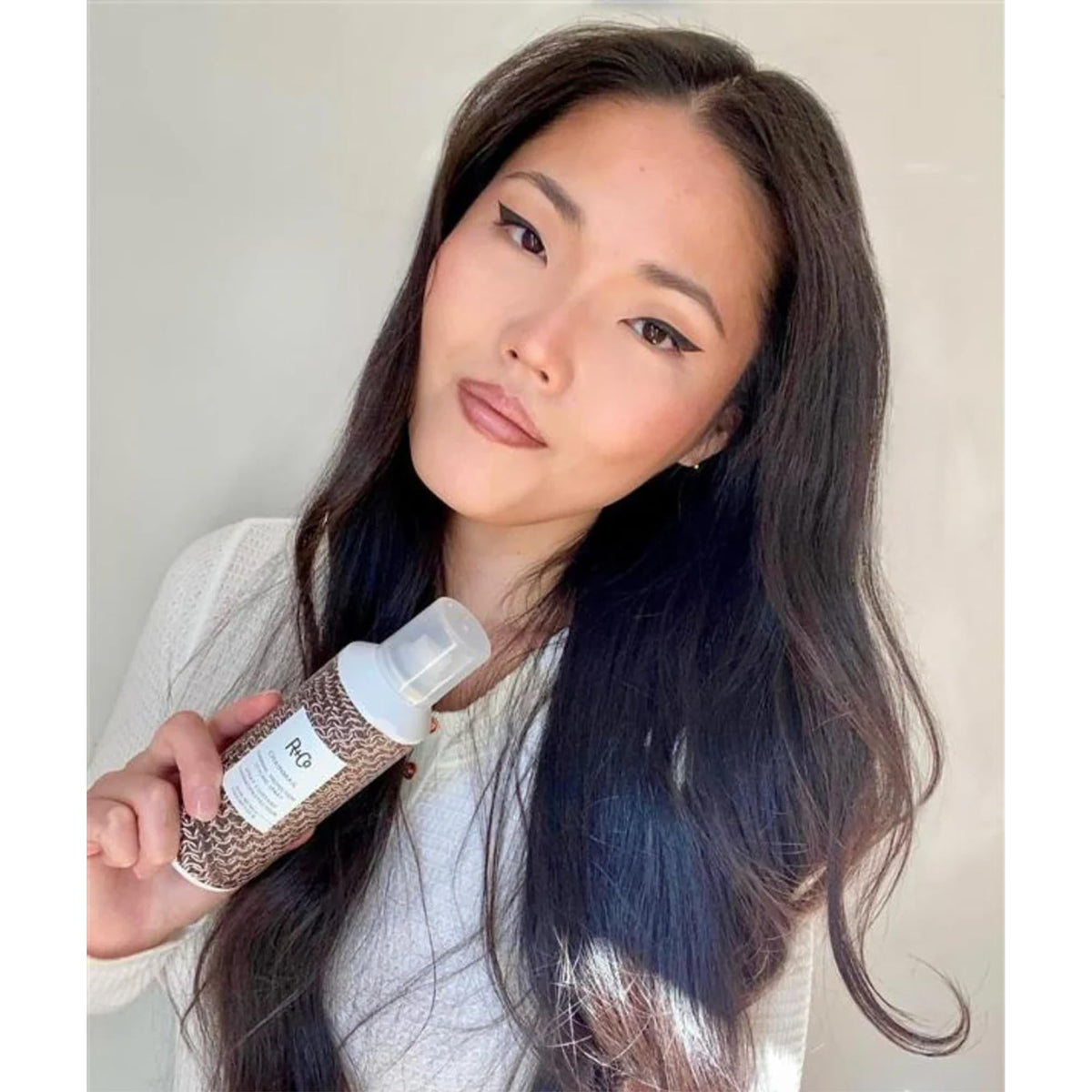 R+Co Outer Space hairspray mist application for easy reworkable styling