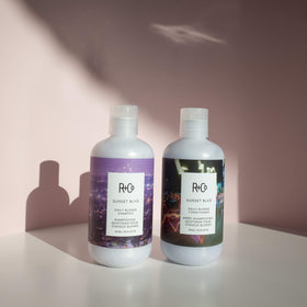 R+Co Sunset Blvd shampoo lather closeup demonstrating gentle daily cleanse.