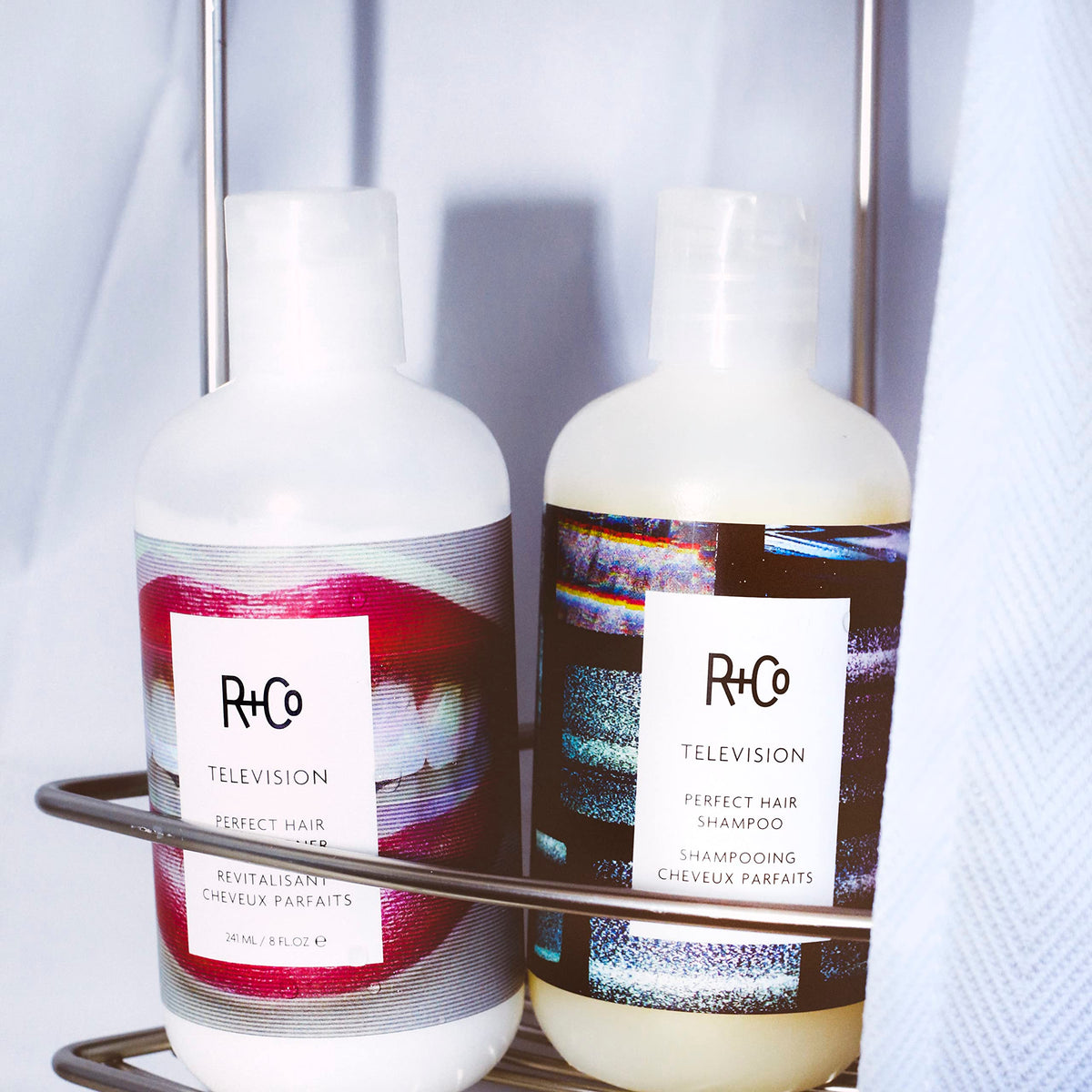 Packaging of R+Co Television Perfect Hair Conditioner highlighting premium design.