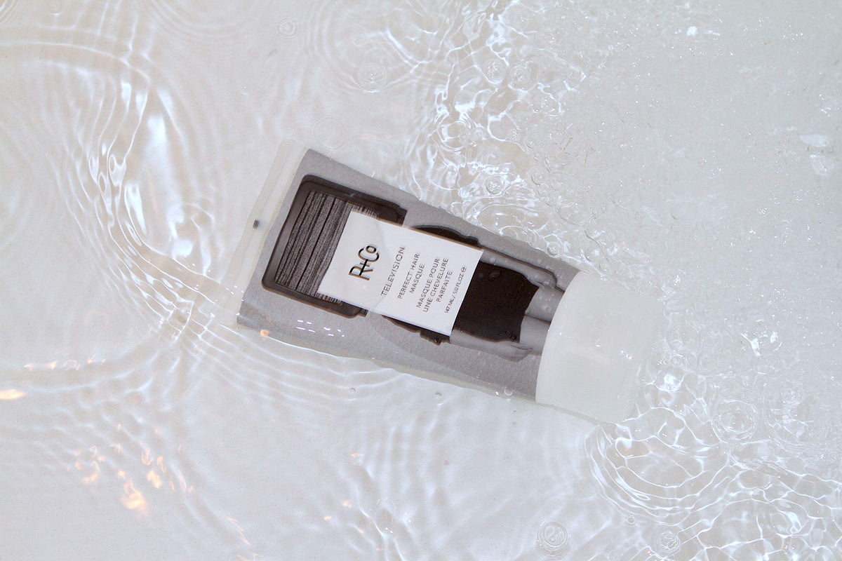 R+Co TELEVISION Perfect Hair Masque application scene suggests easy styling.