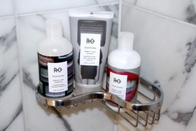 R+Co TELEVISION Perfect Hair Masque on shelf signals premium conditioning.