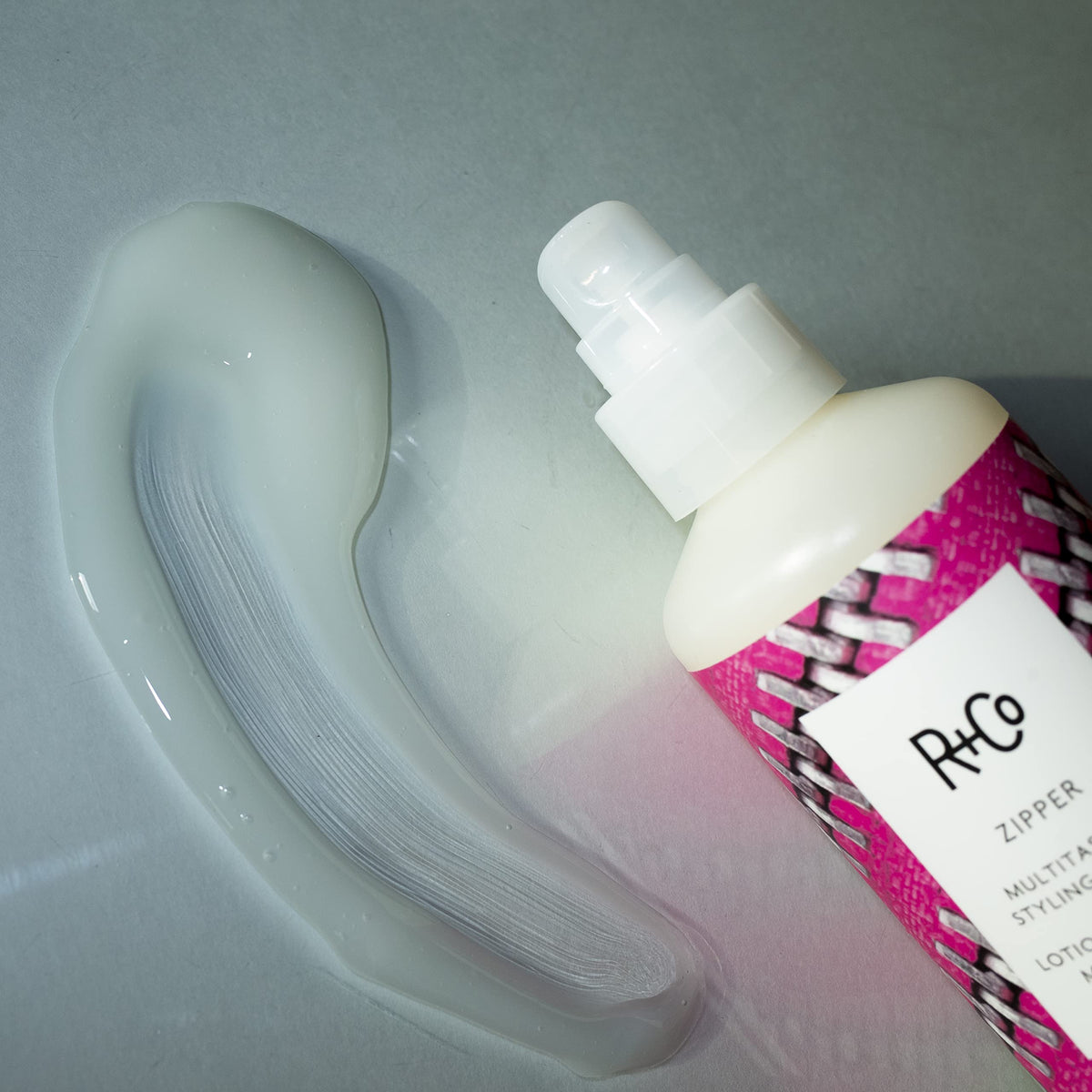 R+Co Zipper multitasking lotion adds flexible hold with natural movement.