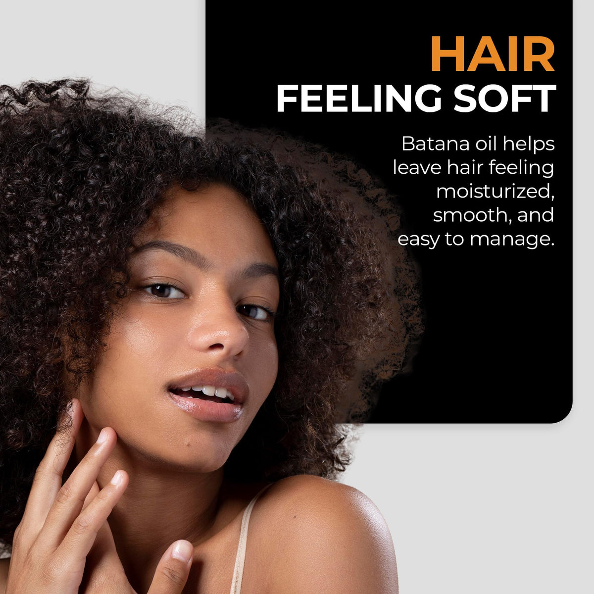 Humid day frizz being tamed with Batana Oil Leave-In for defined, manageable curls.