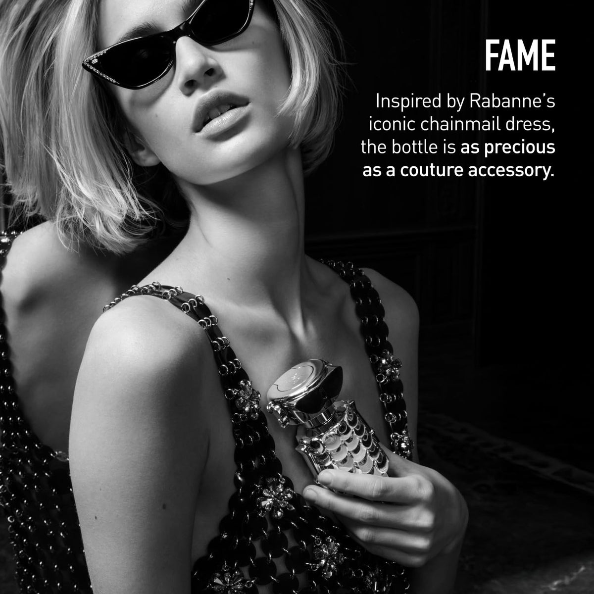 Woody scent visualization of Fame Parfum against a dark backdrop.