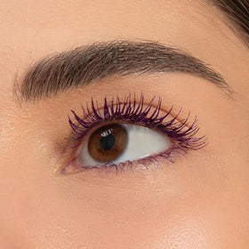Radiant Professional Mascara triple brush demonstrates definition and volume with precise application.