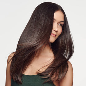 Rahua symbiotic-oils nourish hair strands while cleansing scalp.