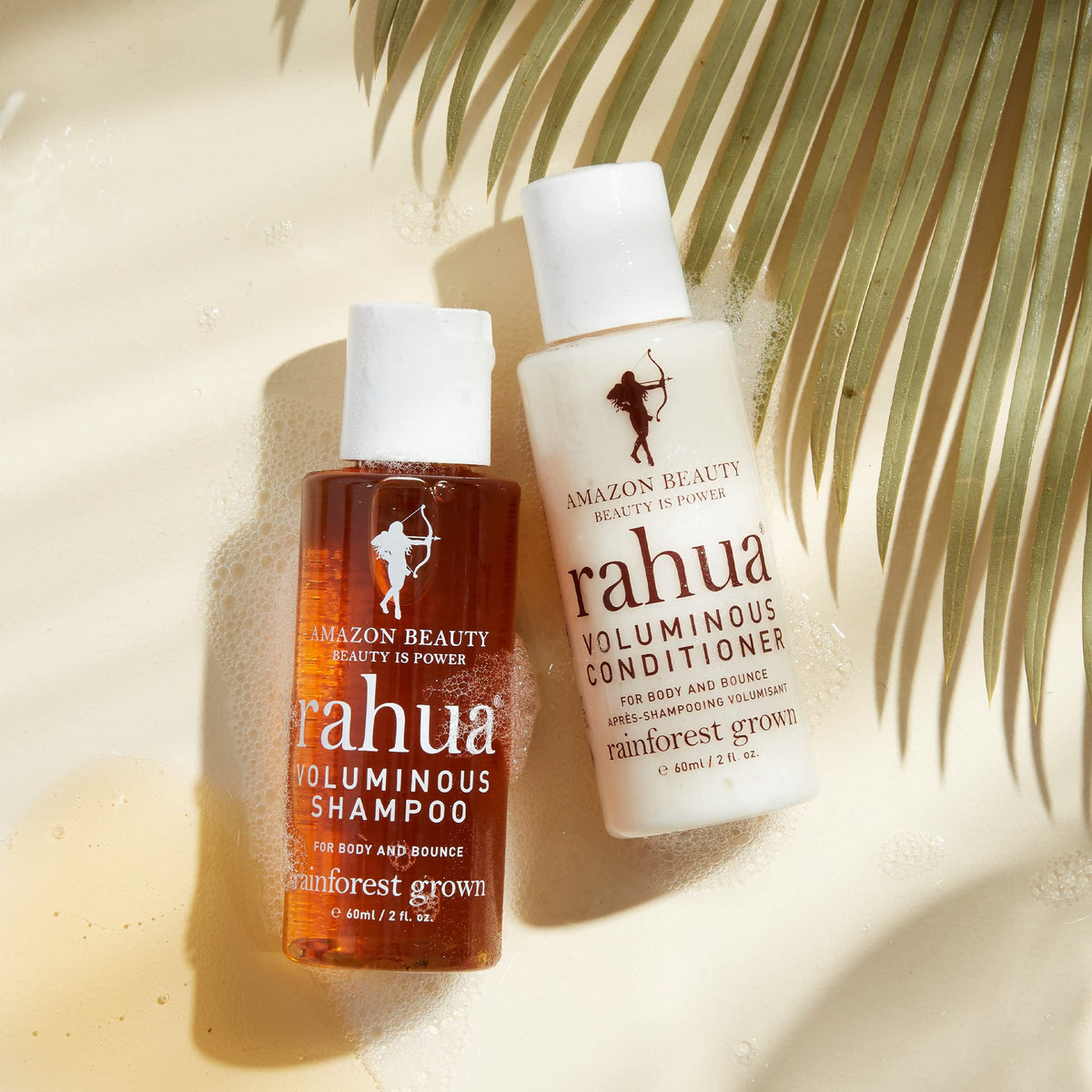 Rahua Voluminous Shampoo close-up on shiny, bouncy strands.